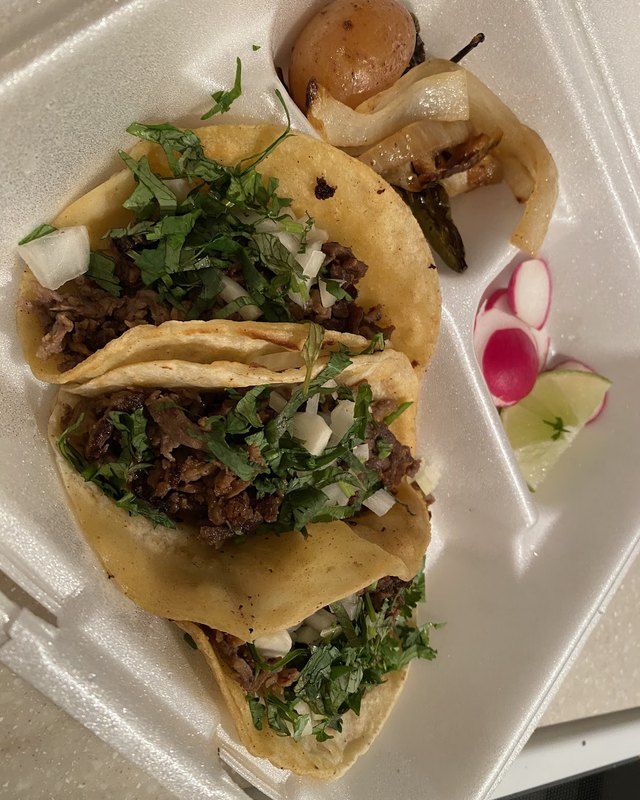 Soft corn street tacos with cilantro and onion