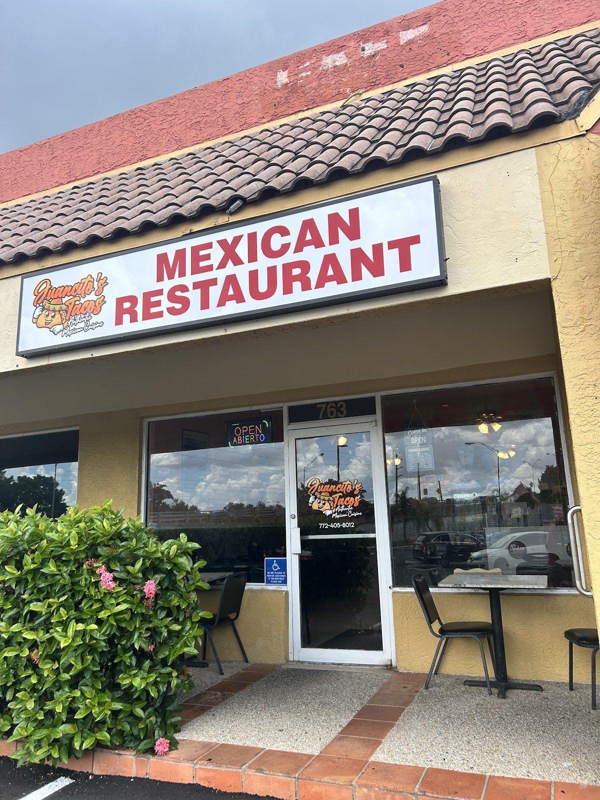 The Juancito's storefront — the 'Mexican Restaurant' sign under a tile roof on Federal Highway